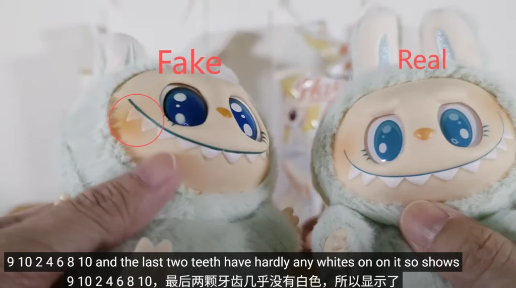 Macro paint details at teeth and hair tips showing clean edges on Baba Labubu